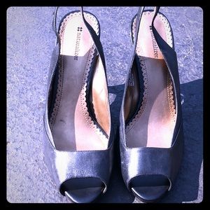 Sling back peep toed heels in black